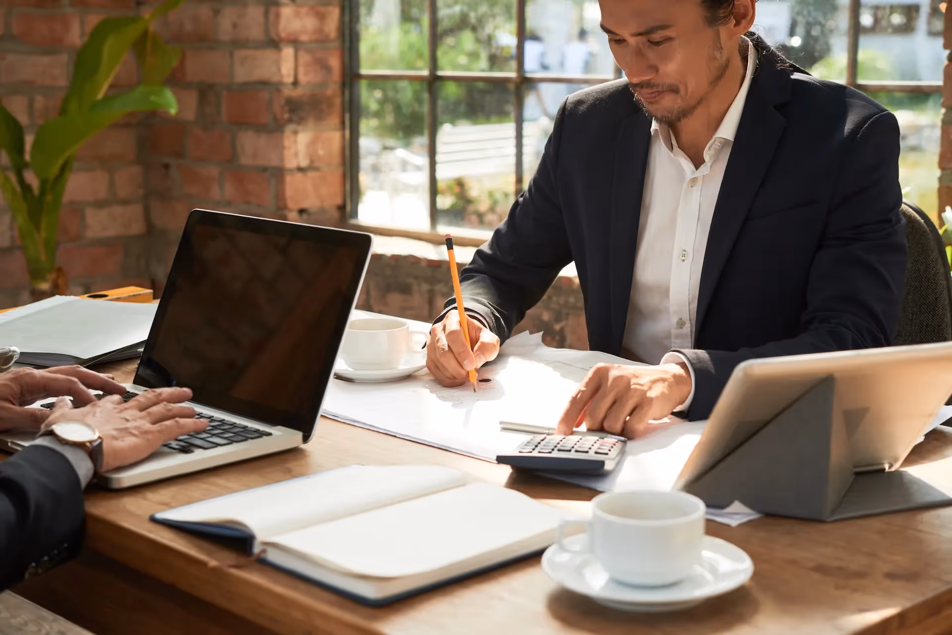 Businessman working with papers — Quality of Earnings