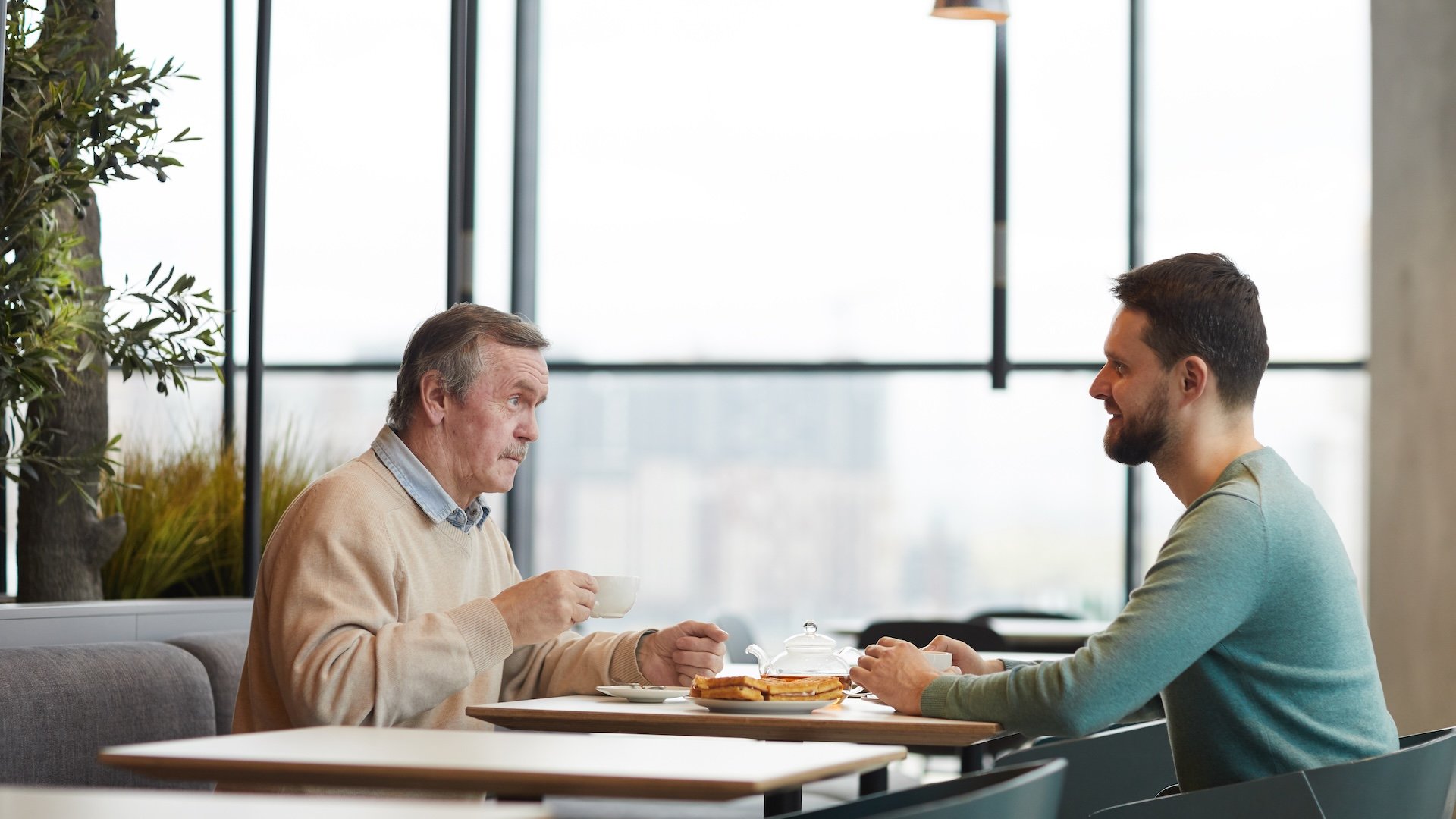 two-men-having-breakfast-2025-02-11-15-40-09-utc